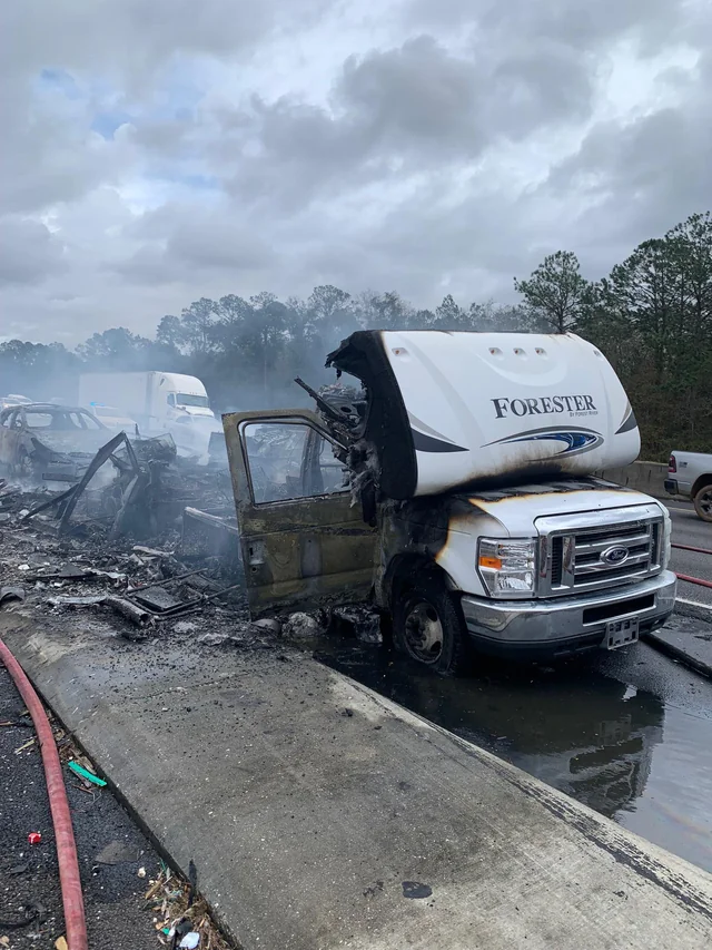 A motor home is totaled after a fire on the freeway
