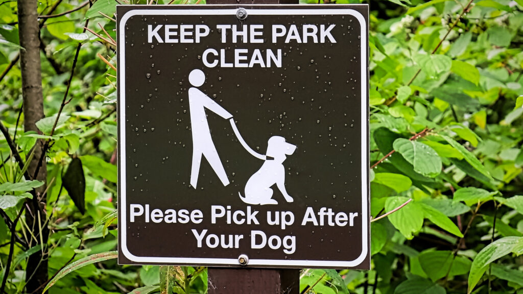 A dog sign on a mobile home site